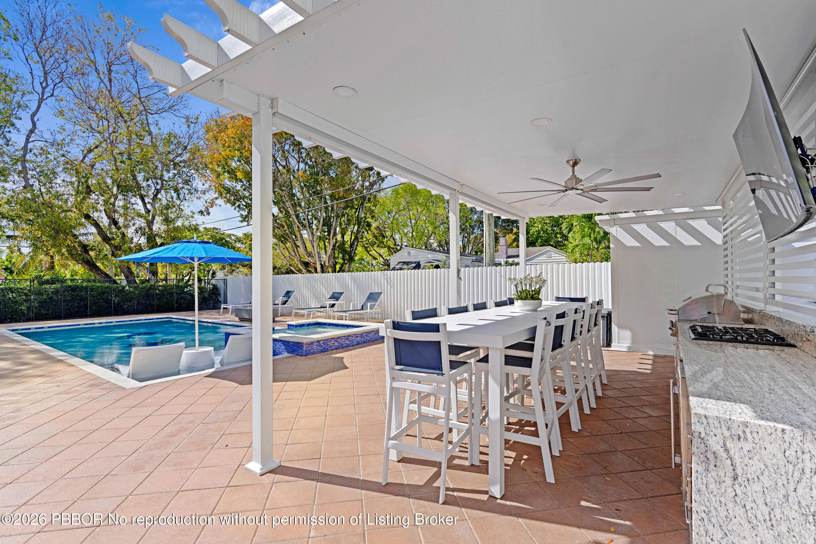 747 Avon Road West Palm Beach, FL 33401 - Photo 16 of 29 a view of a dining area with furniture window and outside view