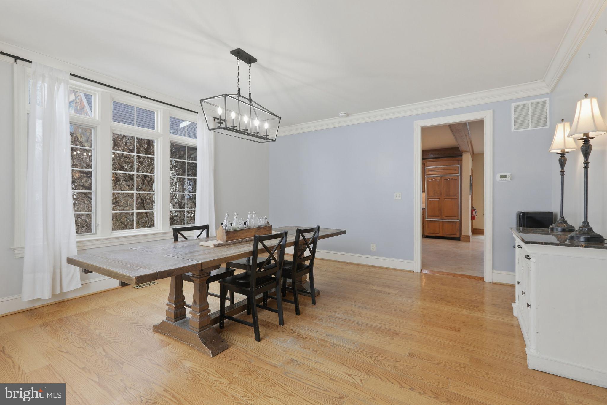 231 Hill Road Elverson, PA 19520 - Photo 13 of 60 a view of a dining room with furniture window and wooden floor