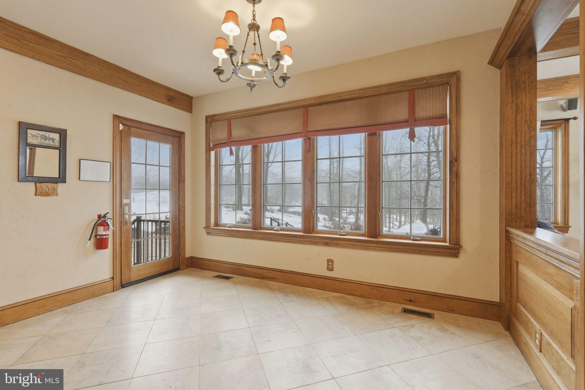 231 Hill Road Elverson, PA 19520 - Photo 21 of 60 a view of an empty room with a window