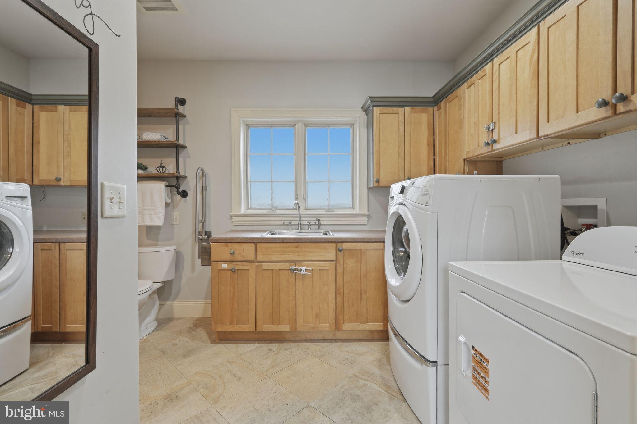 231 Hill Road Elverson, PA 19520 - Photo 30 of 60 Mudroom with Laundry and Full Bath