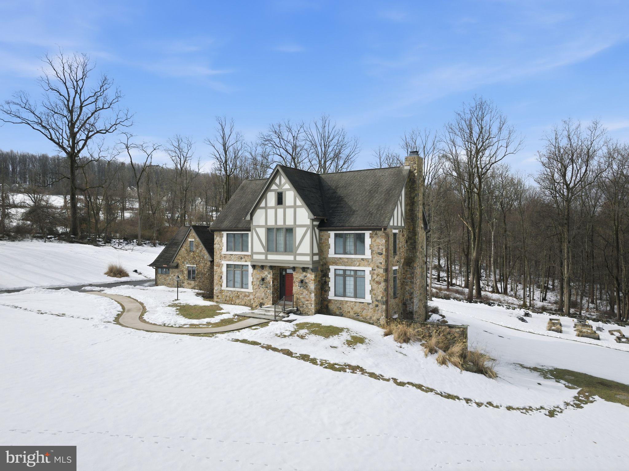 231 Hill Road Elverson, PA 19520 - Photo 3 of 60 a view of a house with snow on the background