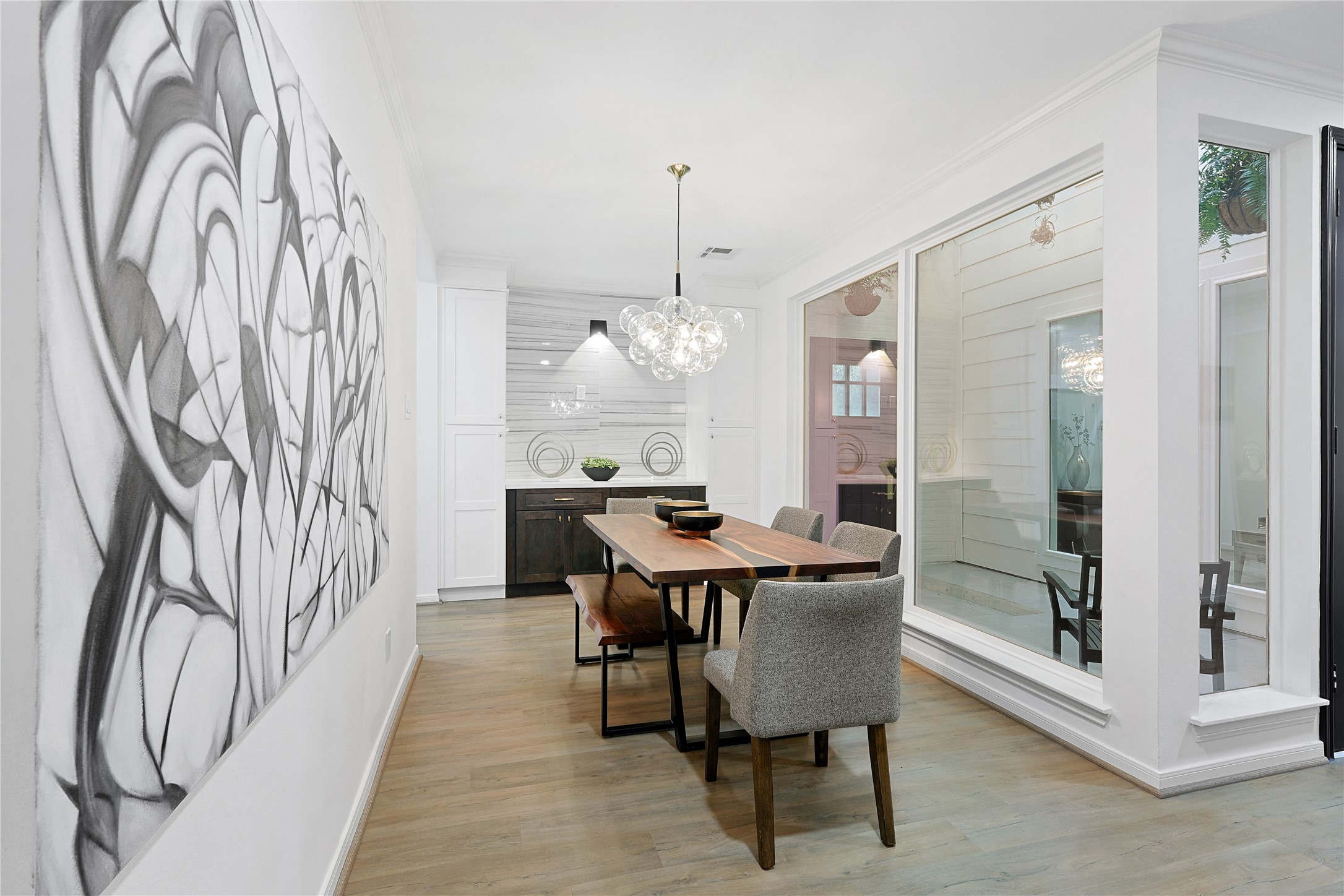 a dining room with furniture and window