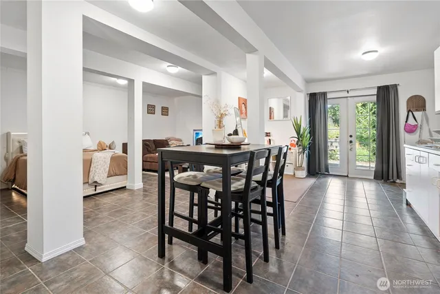 a utility room with sink dryer and washer