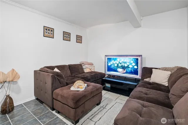 a bedroom with a bed and glass window