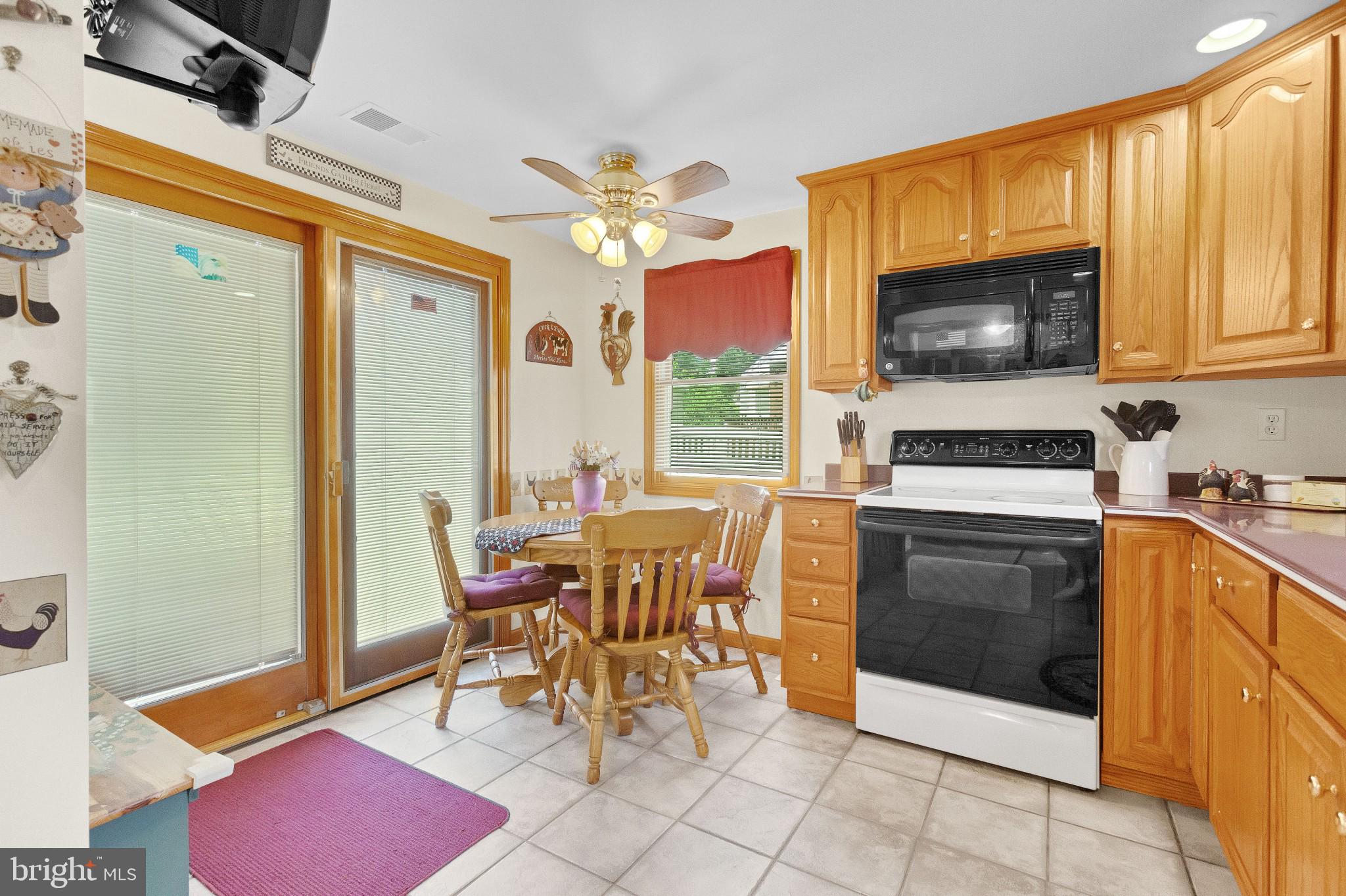 725 Thorndale Road Aldan, PA 19018 - Photo 15 of 30 Kitchen with sliders to the backyard