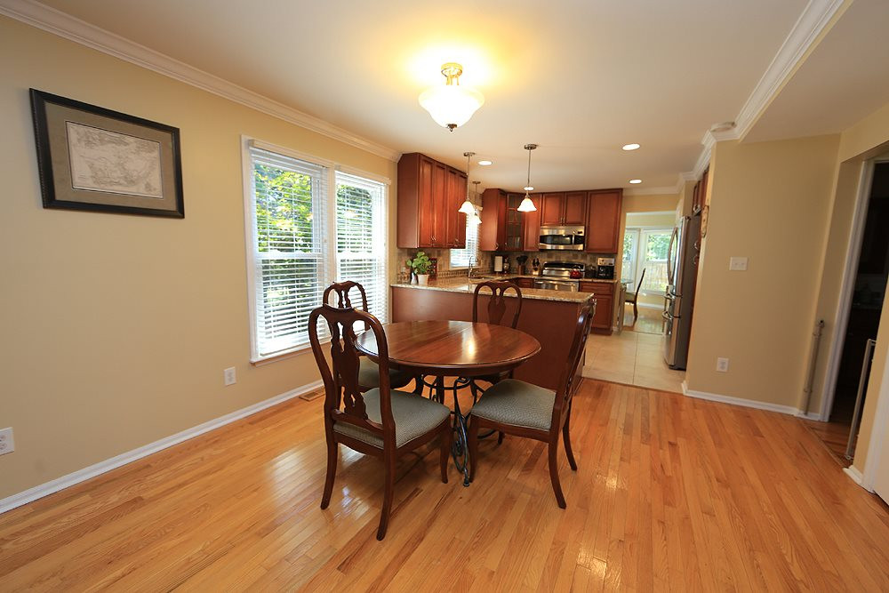 2104 Treverton Place Raleigh, NC 27609 - Photo 25 of 25 Kitchen opens to eating area and to Family Room. Open Floorplan
