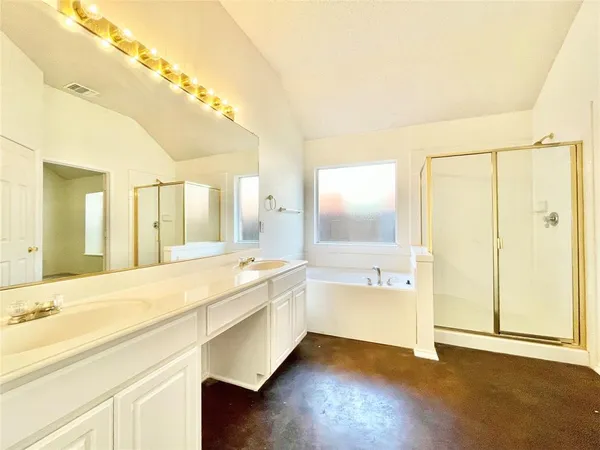 an empty room with a ceiling fan and window