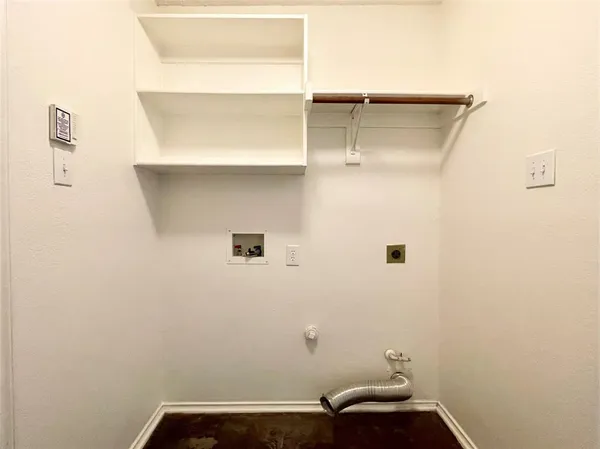 a view of small space with racks on the wall