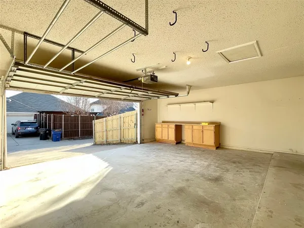 a view of a room with kitchen