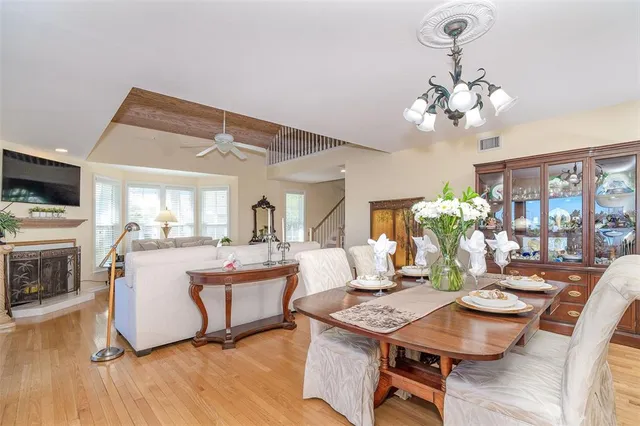 a kitchen with stainless steel appliances a stove a sink and a refrigerator