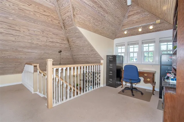 a bathroom with a double vanity sink a toilet and a mirror