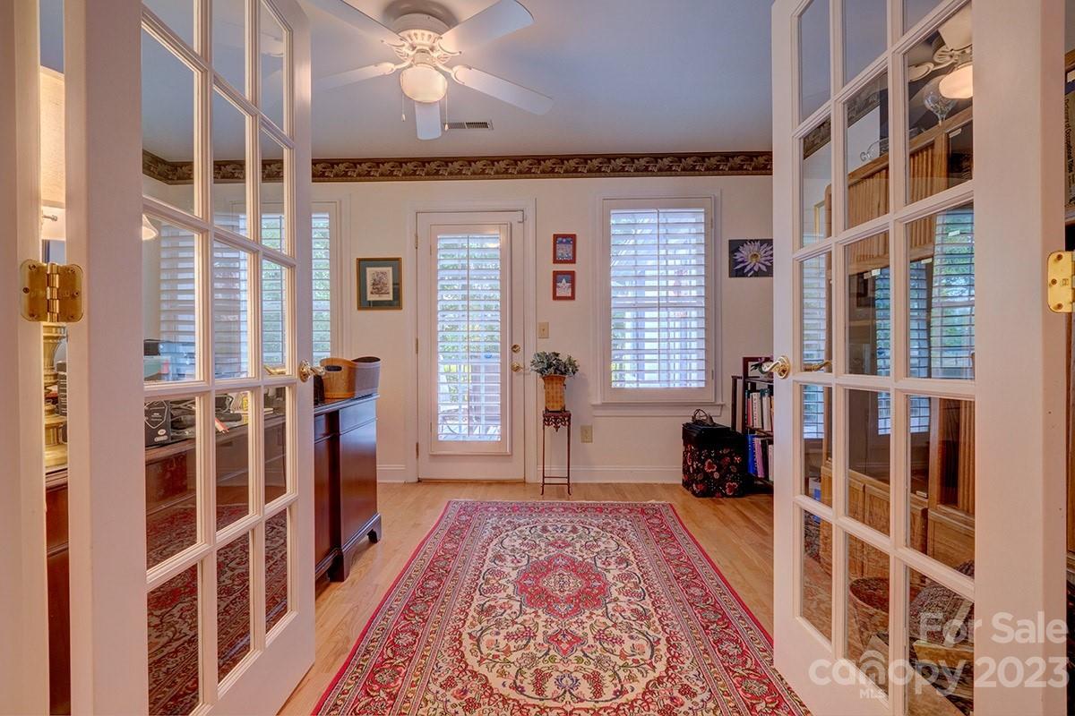 1129 Blowing Rock Cove Fort Mill, SC 29708 - Photo 12 of 37 a view of a bedroom with furniture and windows