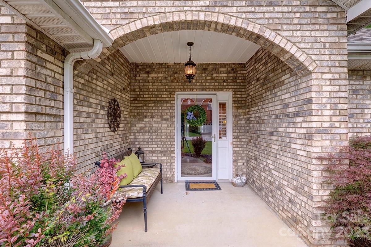 1129 Blowing Rock Cove Fort Mill, SC 29708 - Photo 2 of 37 a front view of a house with an outdoor space