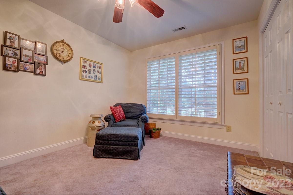 1129 Blowing Rock Cove Fort Mill, SC 29708 - Photo 24 of 37 a living room with furniture and a window