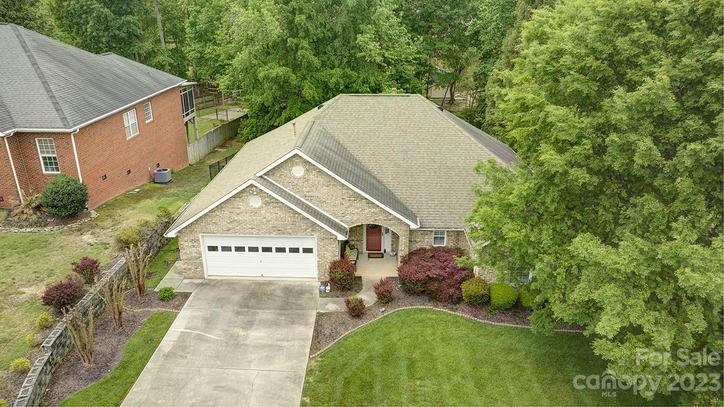 1129 Blowing Rock Cove Fort Mill, SC 29708 - Photo 35 of 37 a view of a house with a yard