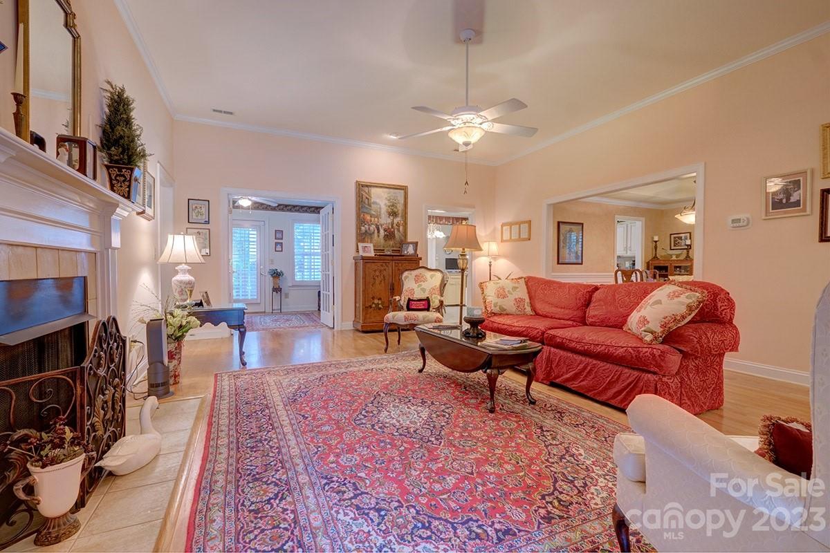 1129 Blowing Rock Cove Fort Mill, SC 29708 - Photo 6 of 37 a living room with furniture and a fireplace