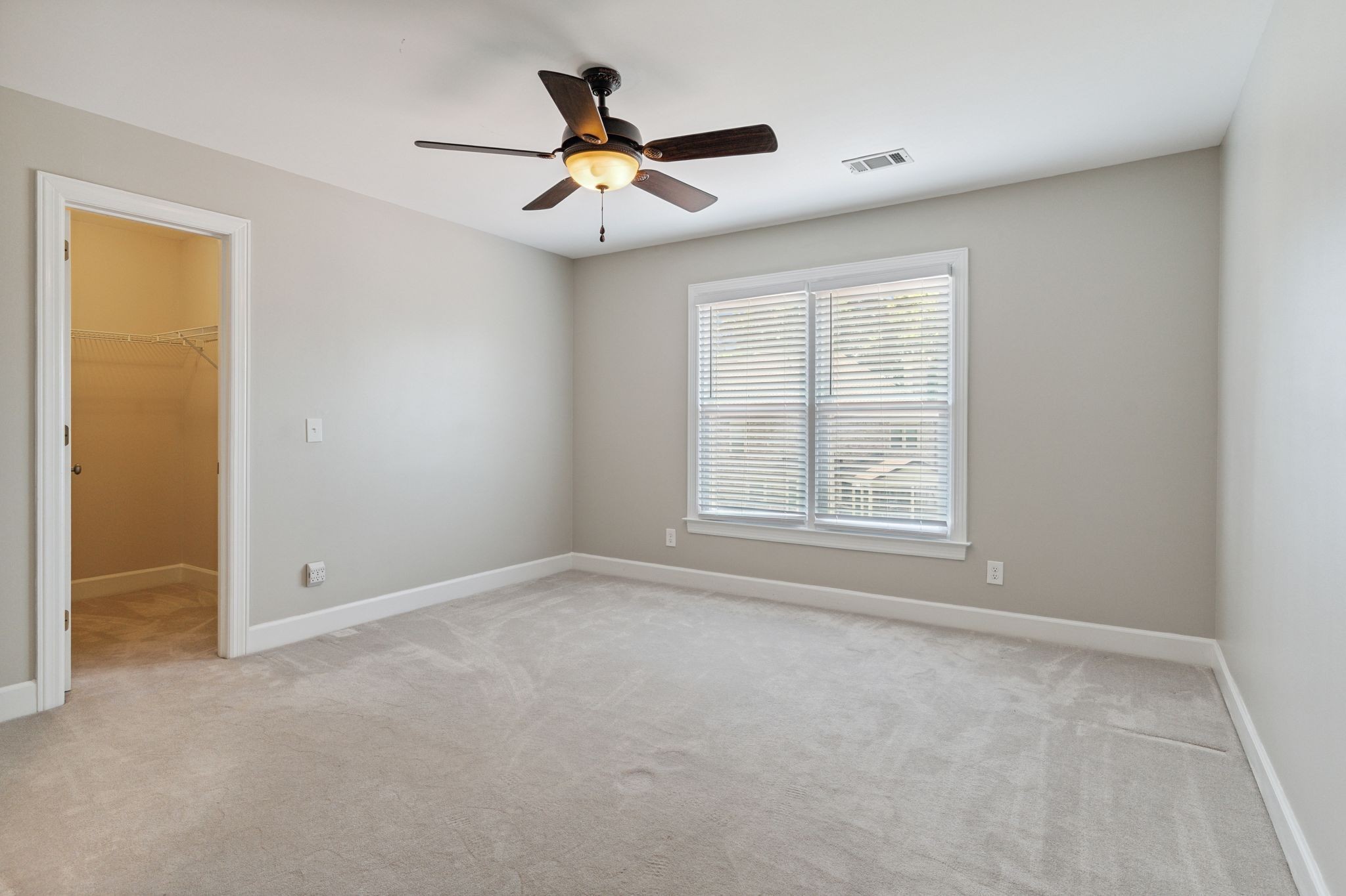 2105 Chels Way Old Hickory, TN 37138 - Photo 33 of 47 an empty room with window and ceiling fan