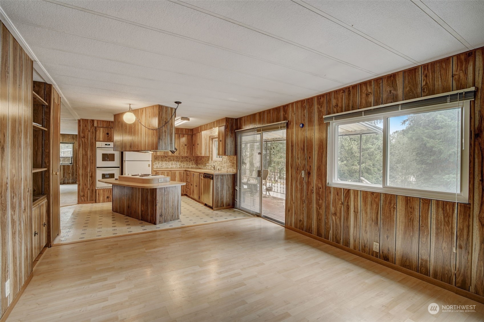 23708 Locust Way, Unit 28A Bothell, WA 98021 - Photo 16 of 40 a open kitchen with stainless steel appliances granite countertop a refrigerator a sink and a stove