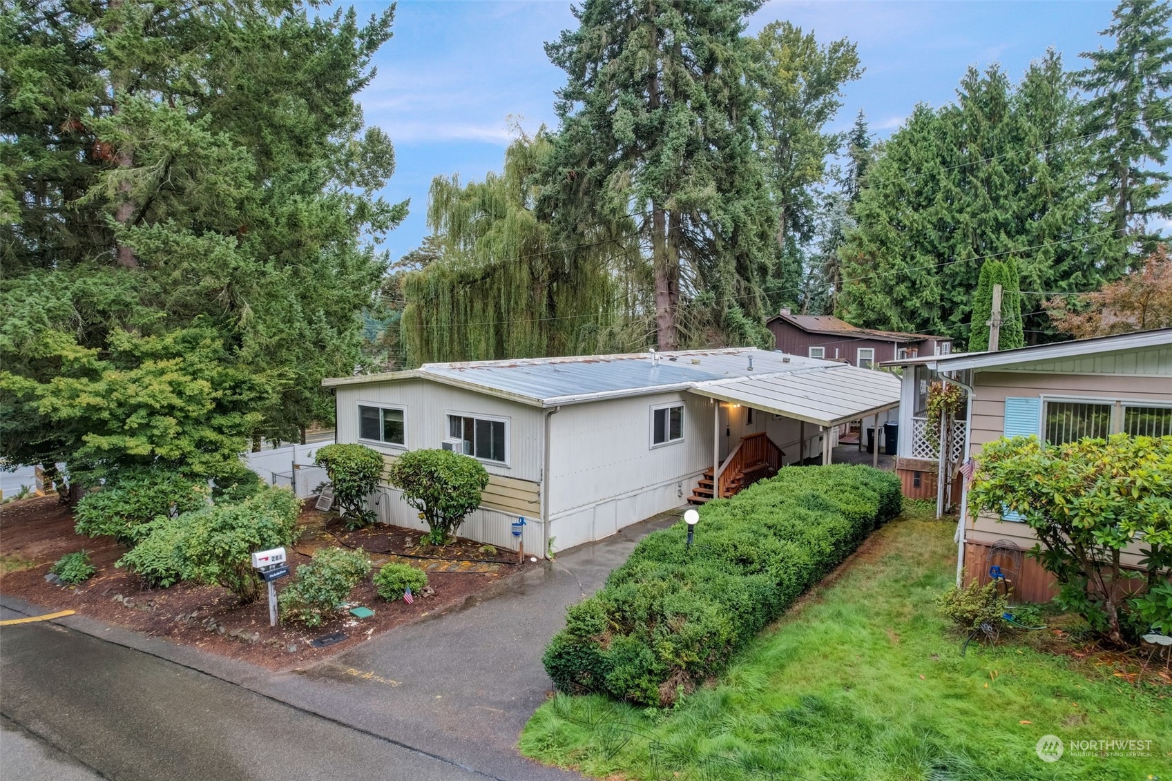 23708 Locust Way, Unit 28A Bothell, WA 98021 - Photo 31 of 40 front view of a house with a yard