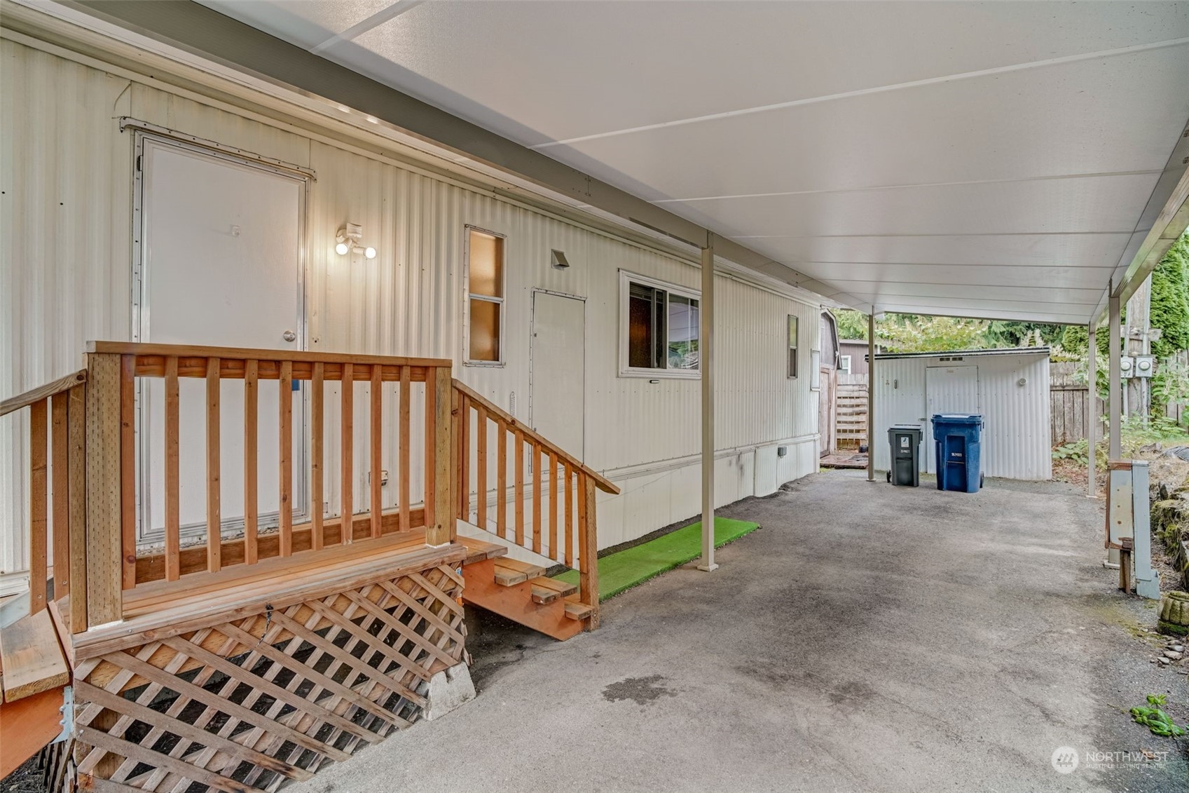 23708 Locust Way, Unit 28A Bothell, WA 98021 - Photo 4 of 40 a view of a porch with wooden floor