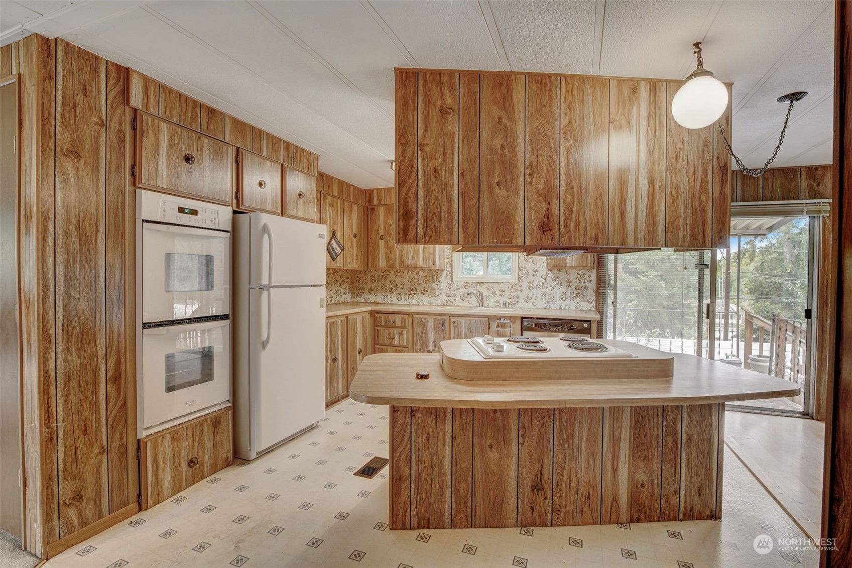23708 Locust Way, Unit 28A Bothell, WA 98021 - Photo 6 of 40 a kitchen with stainless steel appliances a refrigerator and a stove