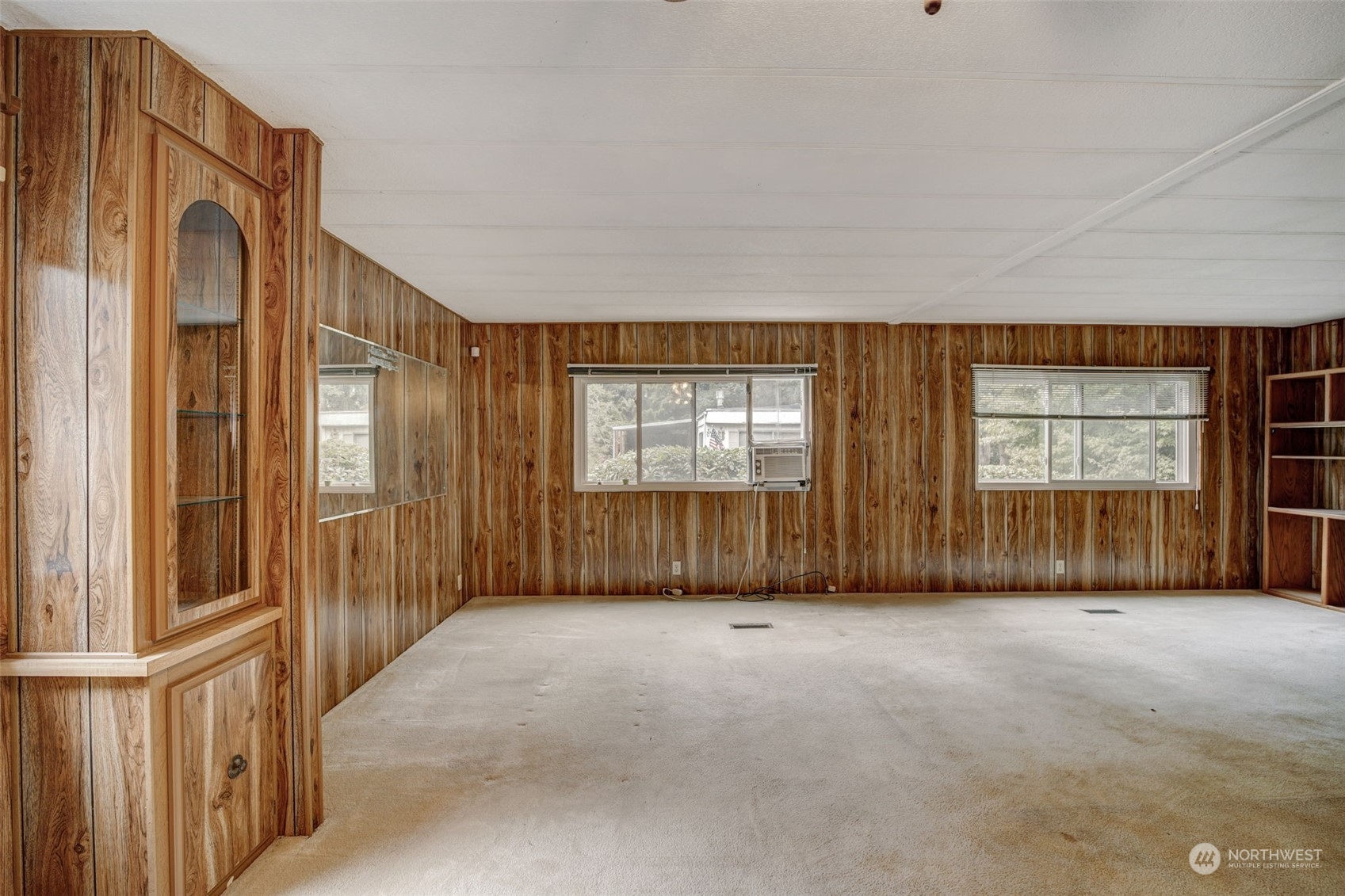 23708 Locust Way, Unit 28A Bothell, WA 98021 - Photo 10 of 40 a view of an empty room with a window