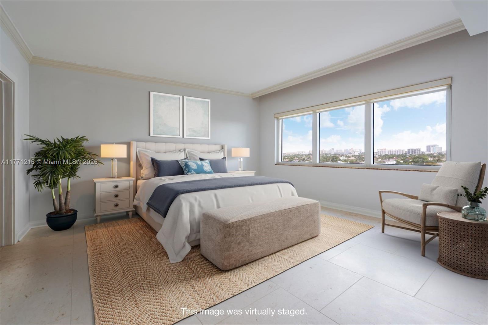 333 Sunset Drive, Unit 804 Fort Lauderdale, FL 33301 - Photo 16 of 28 a bedroom with a bed and a large window