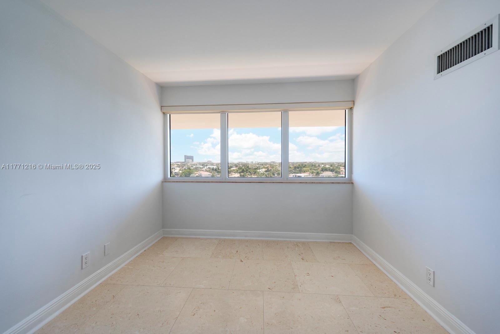 333 Sunset Drive, Unit 804 Fort Lauderdale, FL 33301 - Photo 21 of 28 a view of an empty room with a window