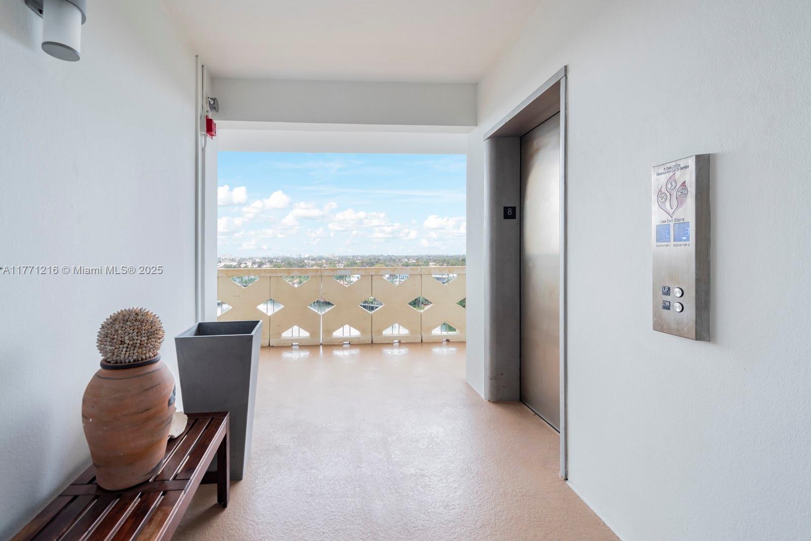333 Sunset Drive, Unit 804 Fort Lauderdale, FL 33301 - Photo 22 of 28 a living room with furniture and a large window