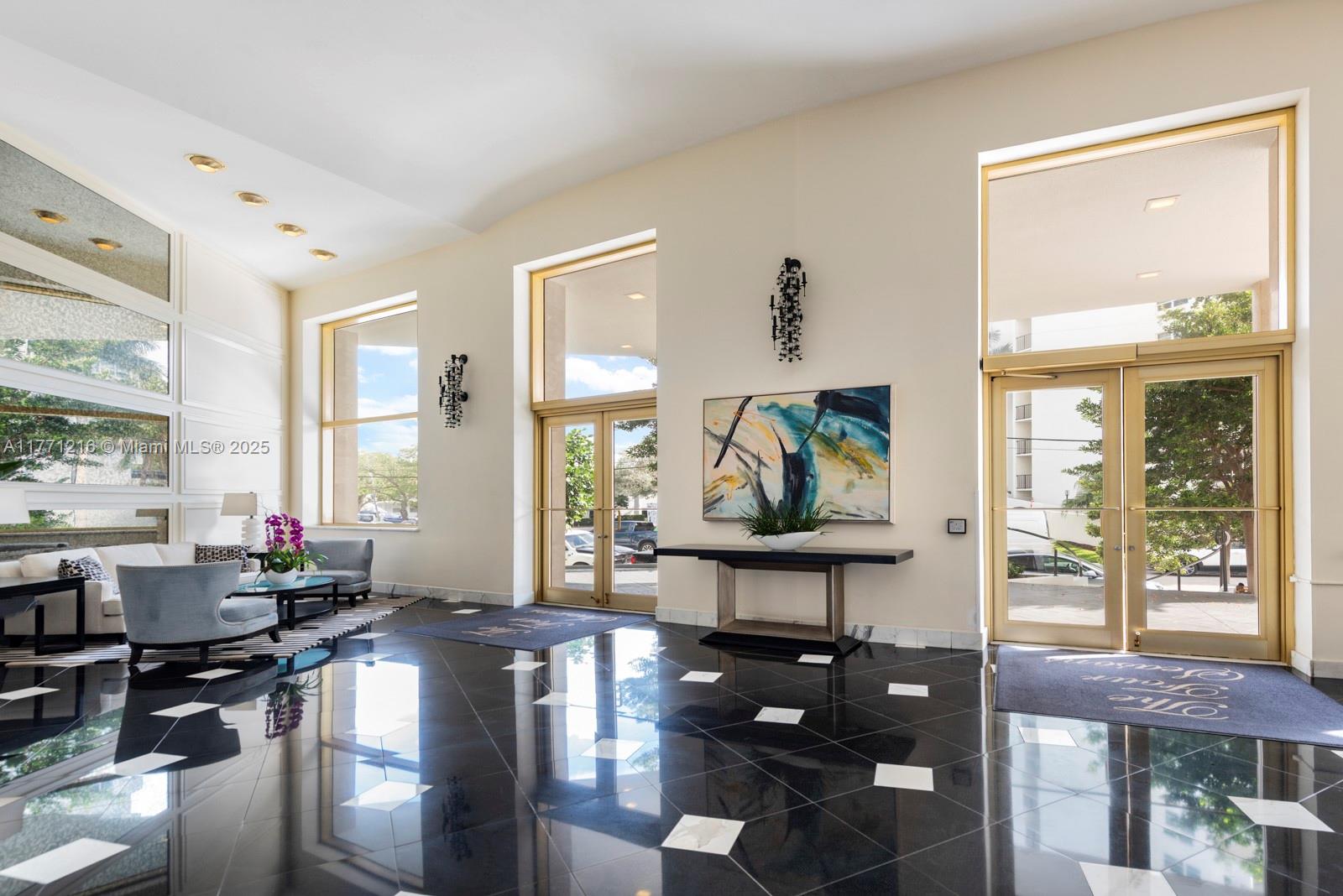 333 Sunset Drive, Unit 804 Fort Lauderdale, FL 33301 - Photo 23 of 28 a living room with furniture and a window