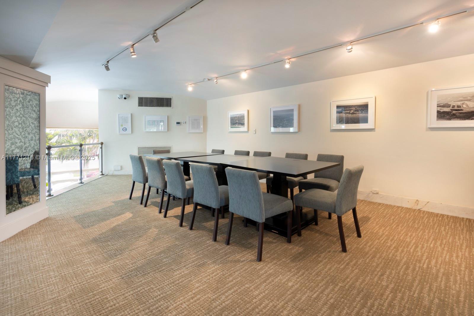 333 Sunset Drive, Unit 804 Fort Lauderdale, FL 33301 - Photo 24 of 28 a view of a dining room with furniture and wooden floor