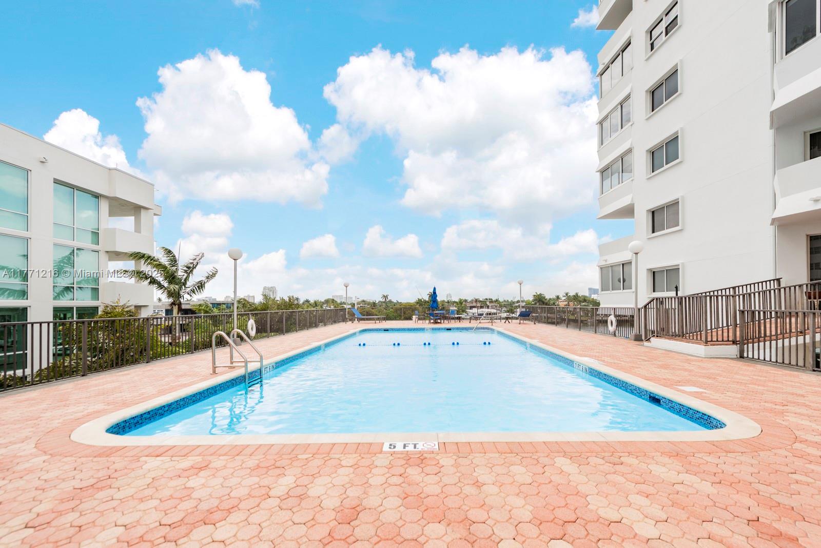 333 Sunset Drive, Unit 804 Fort Lauderdale, FL 33301 - Photo 26 of 28 a view of a swimming pool with a terrace