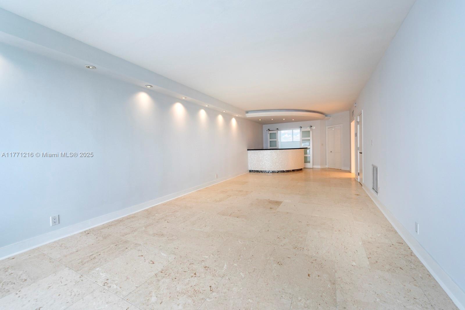 333 Sunset Drive, Unit 804 Fort Lauderdale, FL 33301 - Photo 7 of 28 a view of empty room with closet and windows