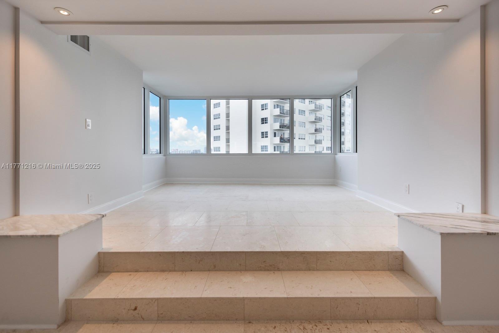 333 Sunset Drive, Unit 804 Fort Lauderdale, FL 33301 - Photo 9 of 28 a bathroom with a bathtub and window