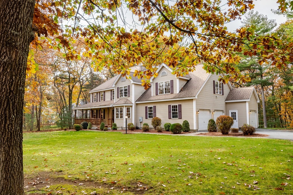 48 Easter Brook Road Lunenburg, MA 01462 - Photo 1 of 38 a front view of house with yard and green space