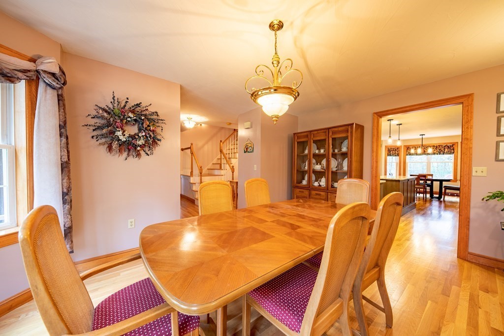 48 Easter Brook Road Lunenburg, MA 01462 - Photo 13 of 38 a view of a dining room with furniture and chandelier