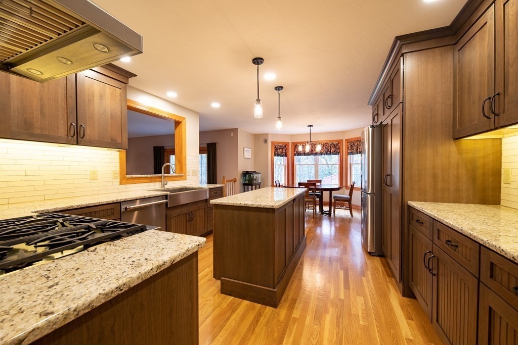 48 Easter Brook Road Lunenburg, MA 01462 - Photo 19 of 38 a kitchen with a stove and a refrigerator