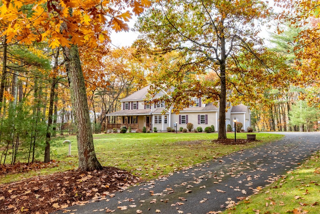 48 Easter Brook Road Lunenburg, MA 01462 - Photo 2 of 38 a front view of a house with a yard