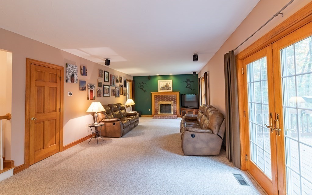 48 Easter Brook Road Lunenburg, MA 01462 - Photo 21 of 38 a living room with furniture and a large window