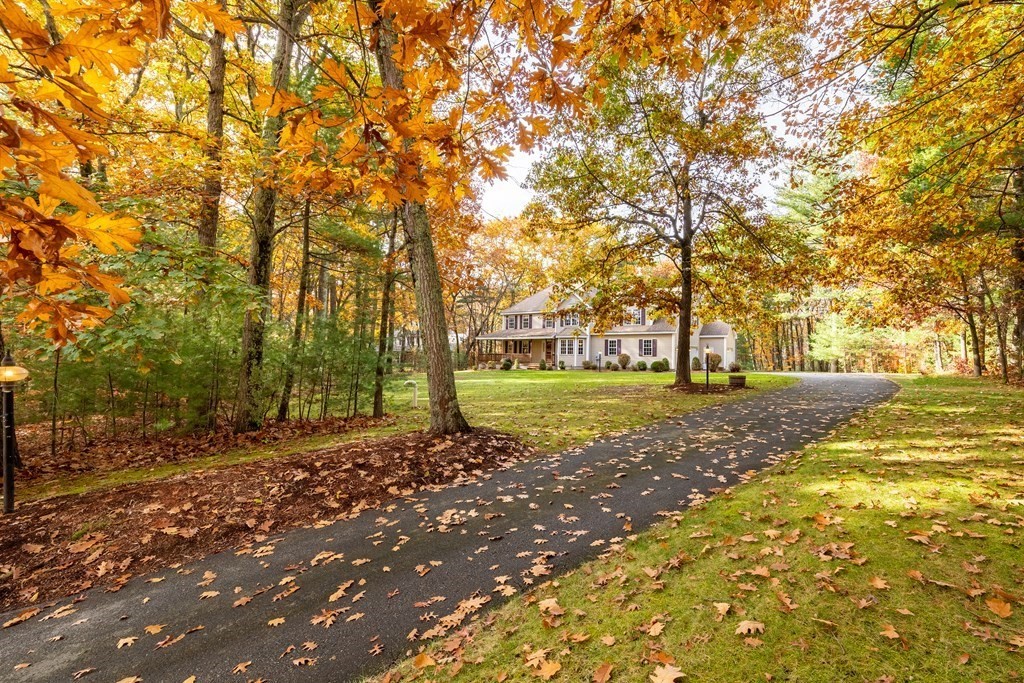 48 Easter Brook Road Lunenburg, MA 01462 - Photo 4 of 38 a view of a tree in the middle of a yard