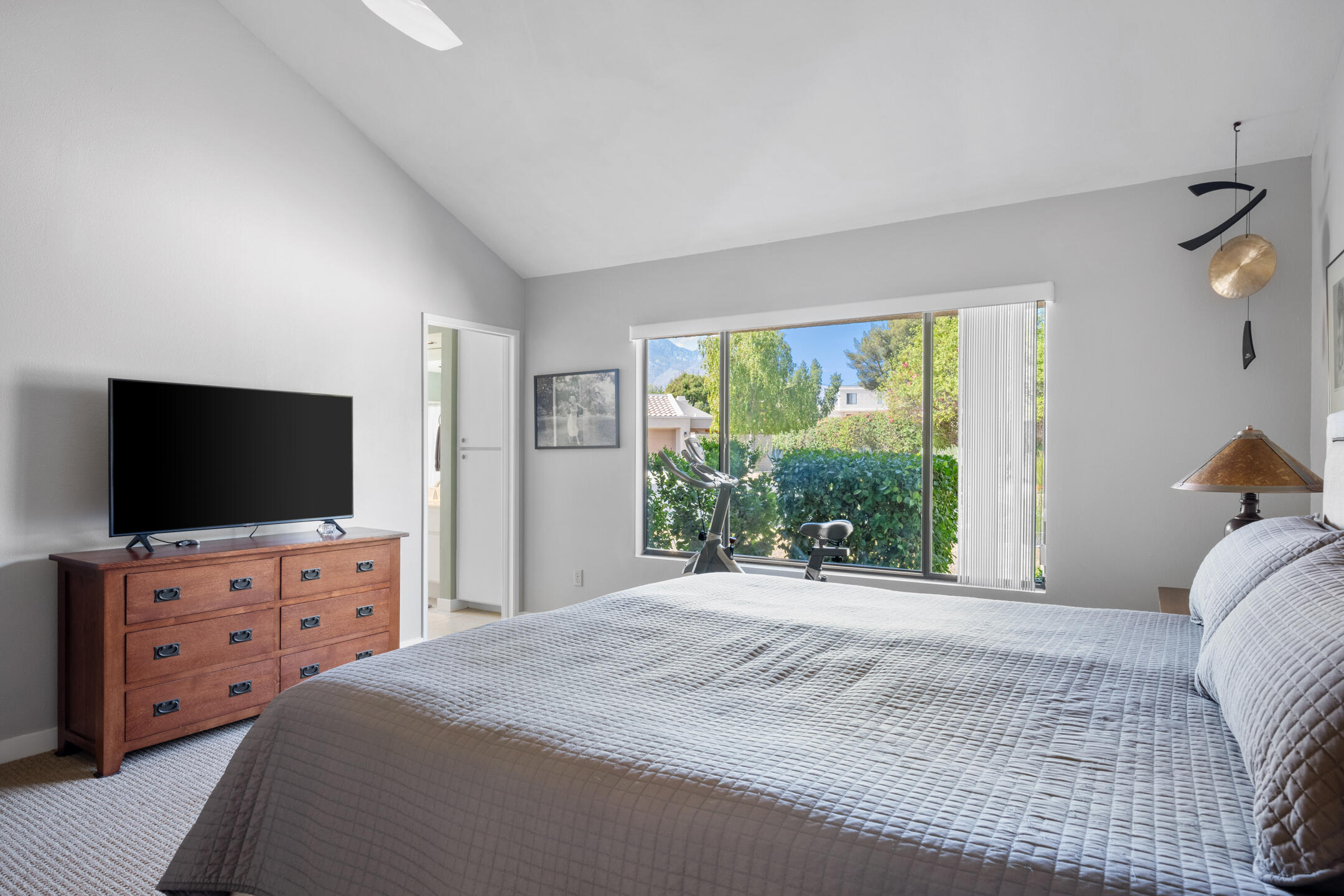 68640 Calle Mancha Cathedral City, CA 92234 - Photo 22 of 54 a bedroom with a bed and a television