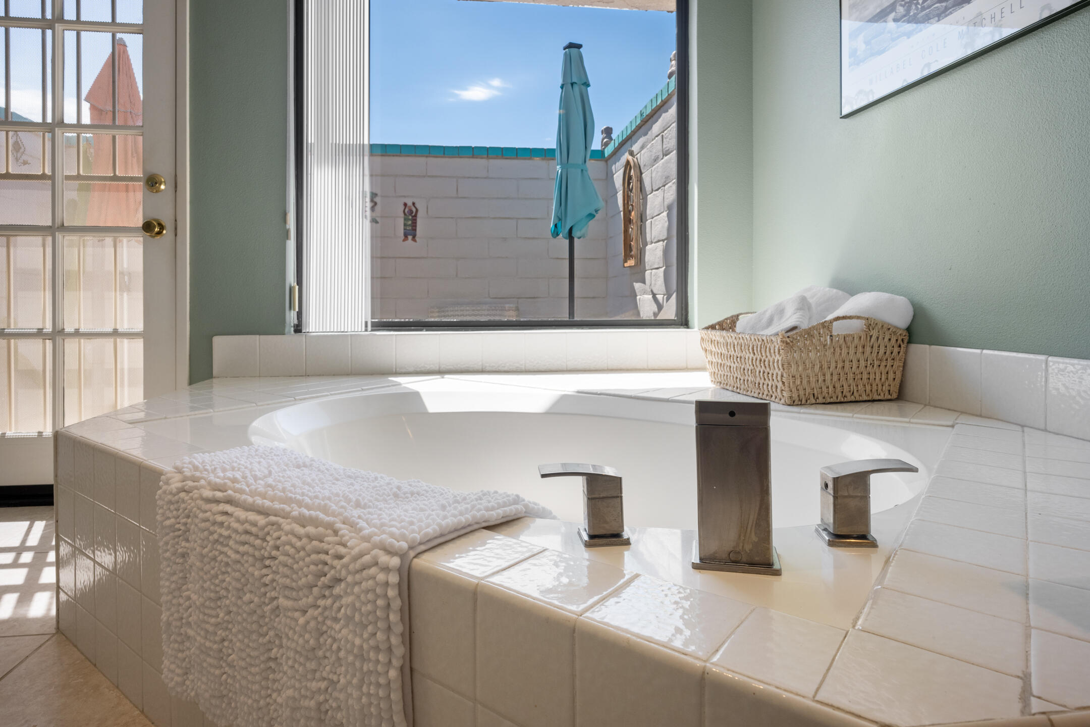 68640 Calle Mancha Cathedral City, CA 92234 - Photo 27 of 54 a bathroom with a granite countertop sink and a mirror