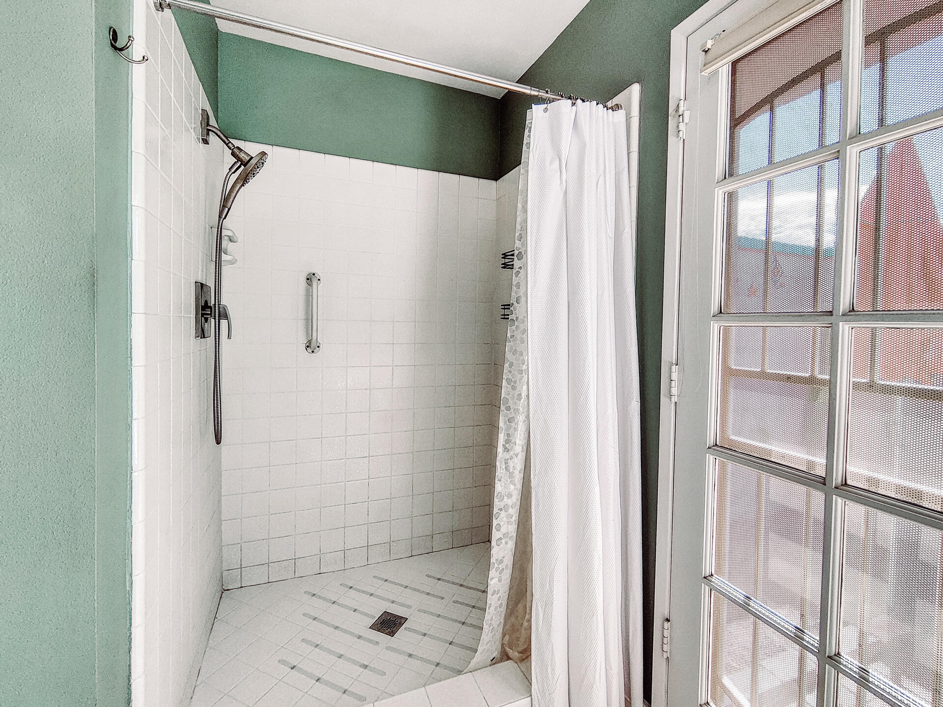 68640 Calle Mancha Cathedral City, CA 92234 - Photo 28 of 54 a bathroom with a glass shower door