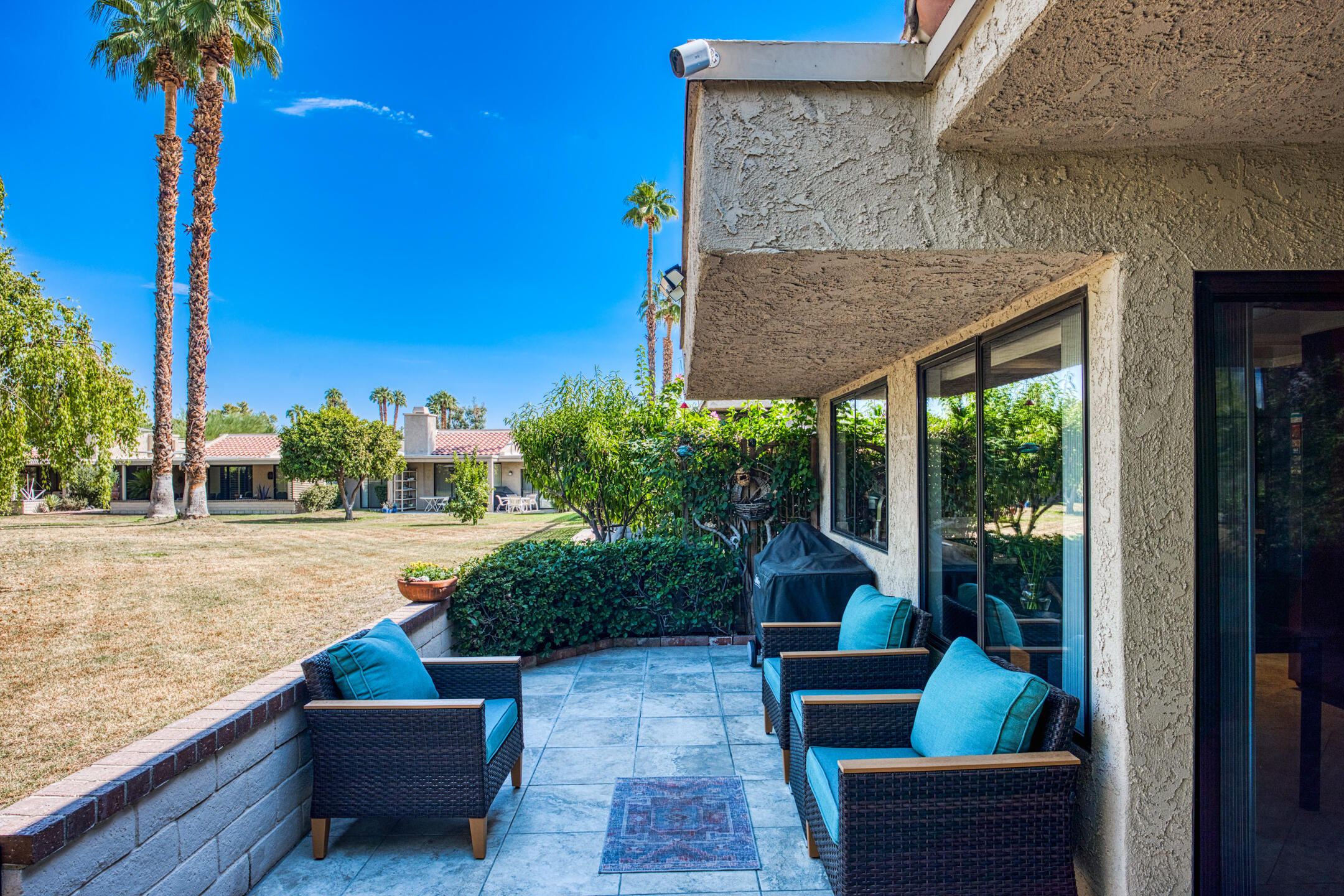 68640 Calle Mancha Cathedral City, CA 92234 - Photo 39 of 54 a house view with a garden space