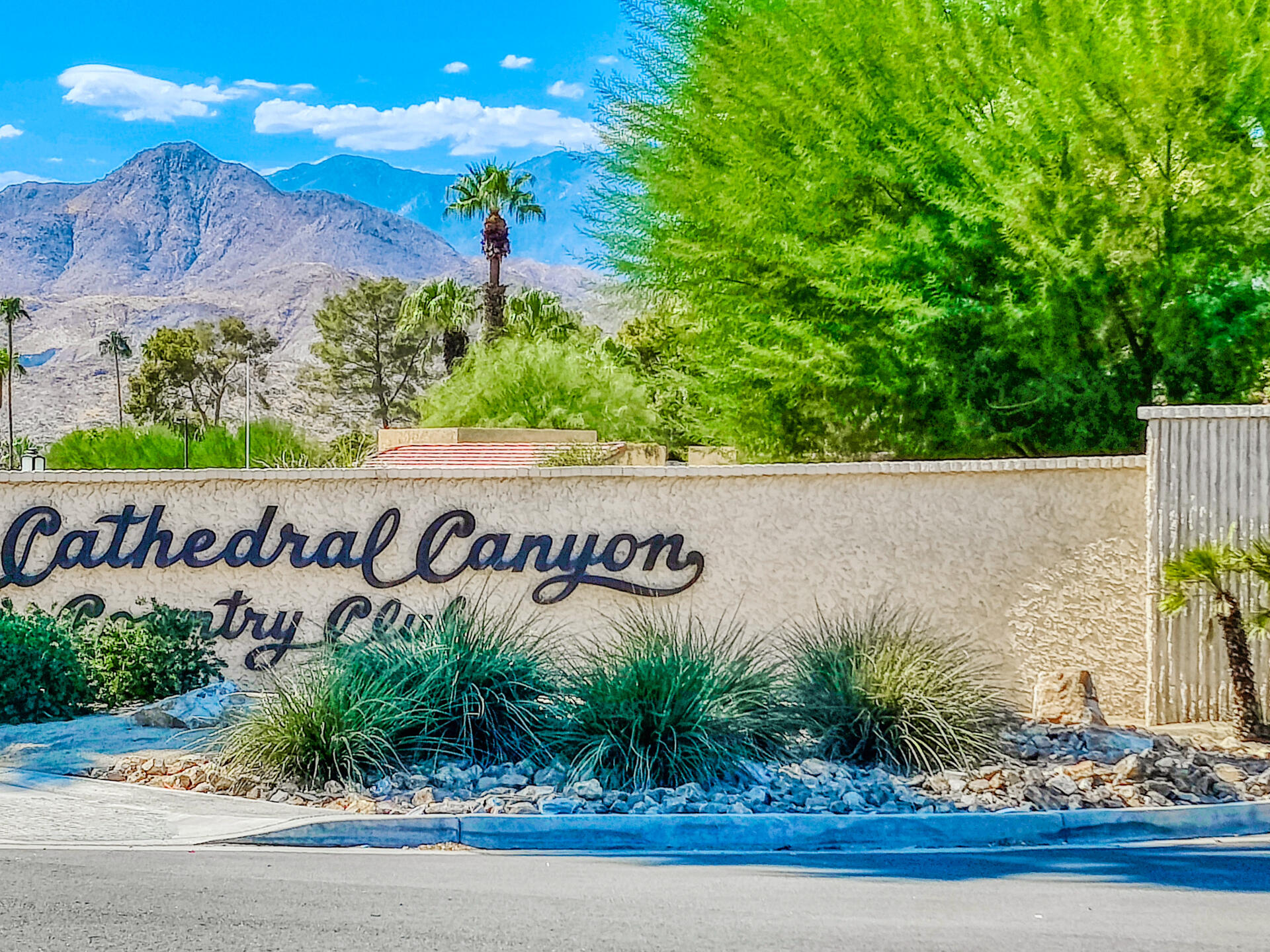 68640 Calle Mancha Cathedral City, CA 92234 - Photo 40 of 54 a sign that is on the side of the road