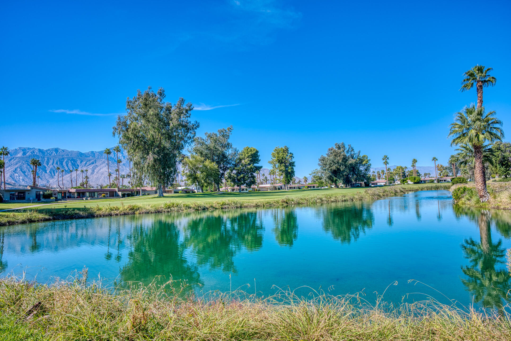 68640 Calle Mancha Cathedral City, CA 92234 - Photo 48 of 54 a view of a lake with houses in the back