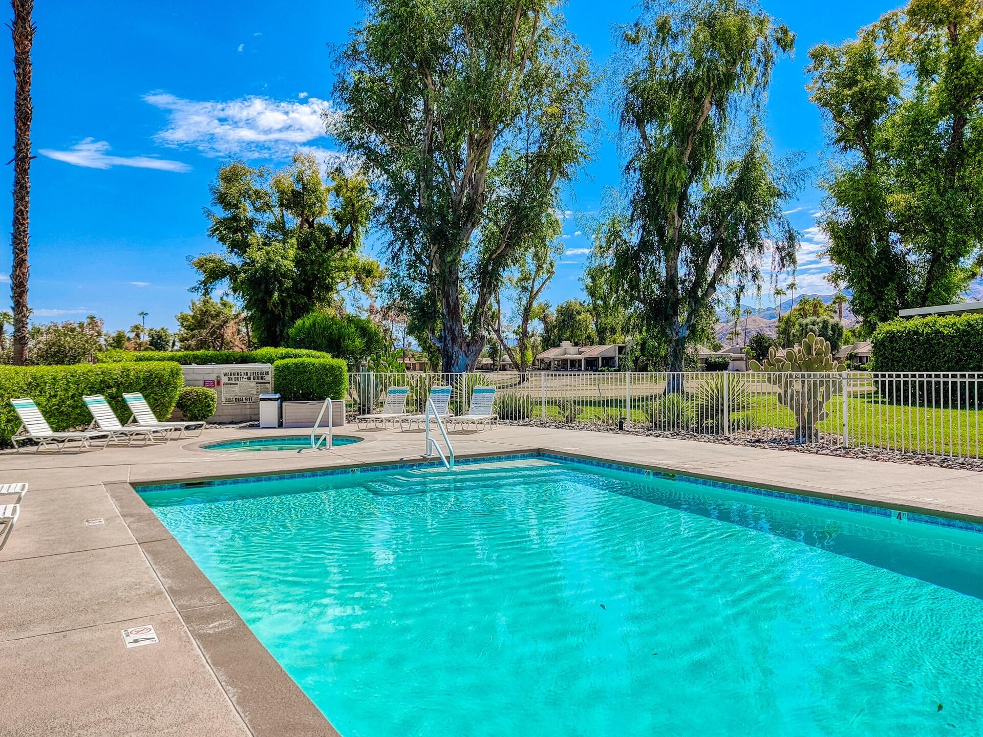 68640 Calle Mancha Cathedral City, CA 92234 - Photo 53 of 54 a view of a swimming pool with a yard