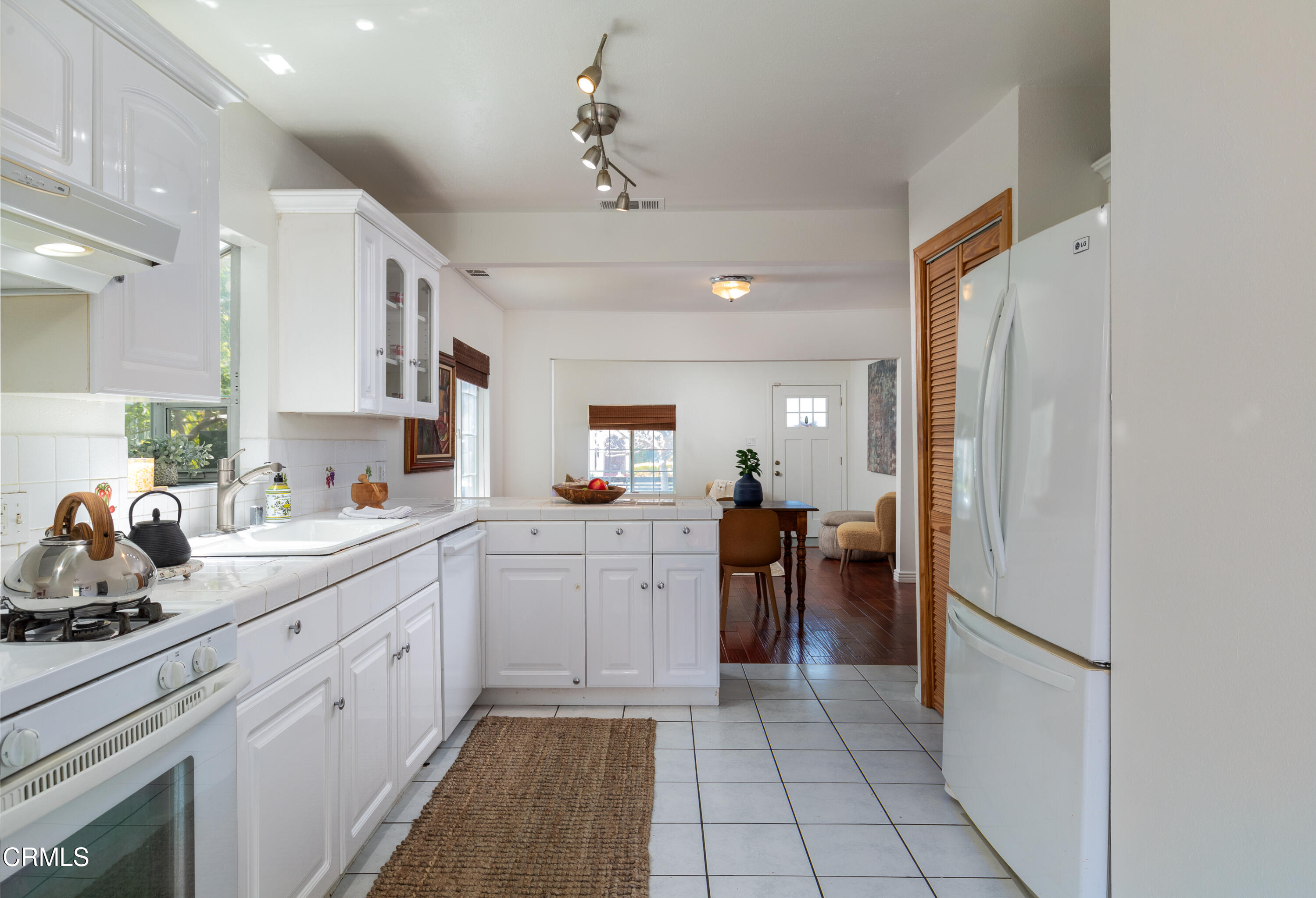 1710 North Ave 46 Eagle Rock, CA 90041 - Photo 11 of 30 a kitchen with a sink and refrigerator