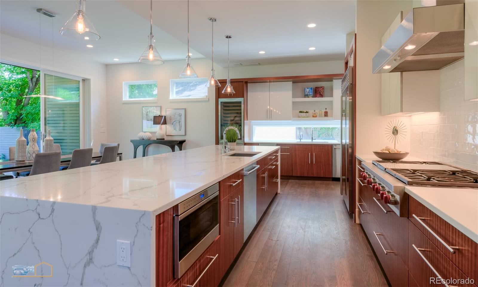 441 Arapahoe Avenue Boulder, CO 80302 - Photo 11 of 40 a kitchen with stainless steel appliances granite countertop a stove and a sink