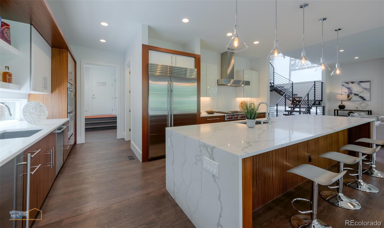 441 Arapahoe Avenue Boulder, CO 80302 - Photo 13 of 40 a large kitchen with a table and chairs